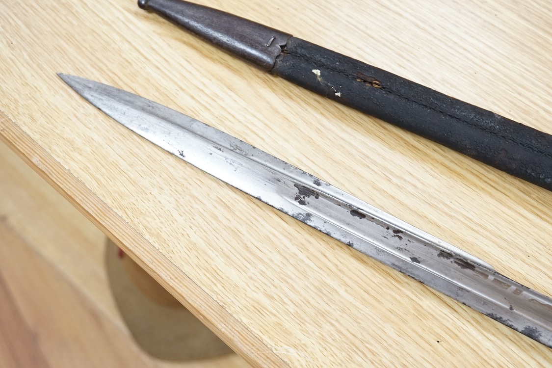 A Prussian M1865 bayonet and scabbard, blade marked with A&AS (for August & Albert Schnitzier), and Wilhelm I crown